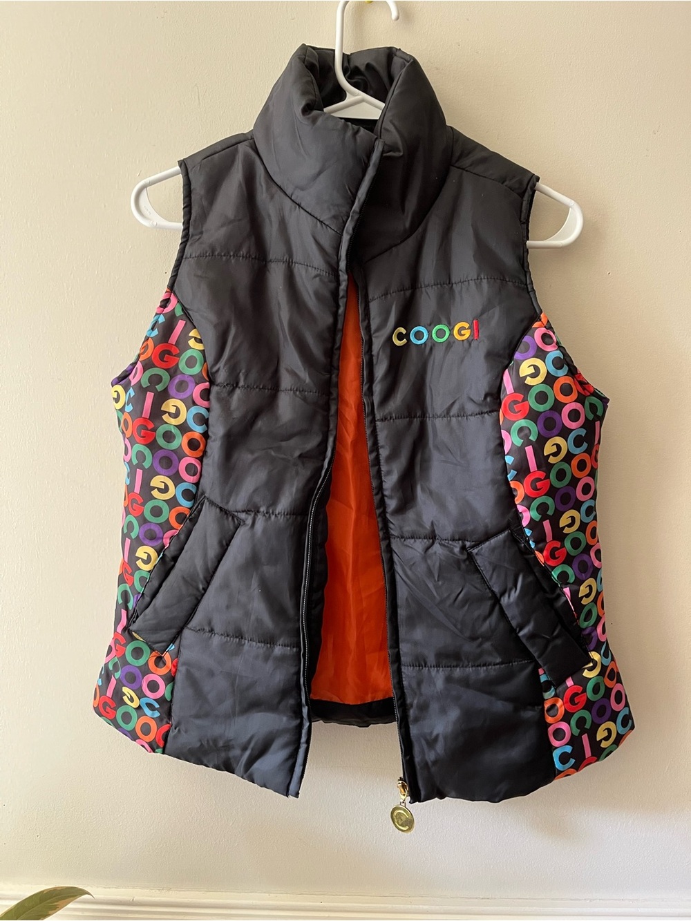 COOGI Black Puffer Vest with Multicolor Logo Panels and Orange Lining size small